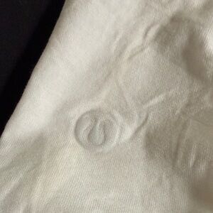 2 pcs Lululemon
Love Tank Top
Pleated Back 
 White 1pc
& Black 1pc tank top